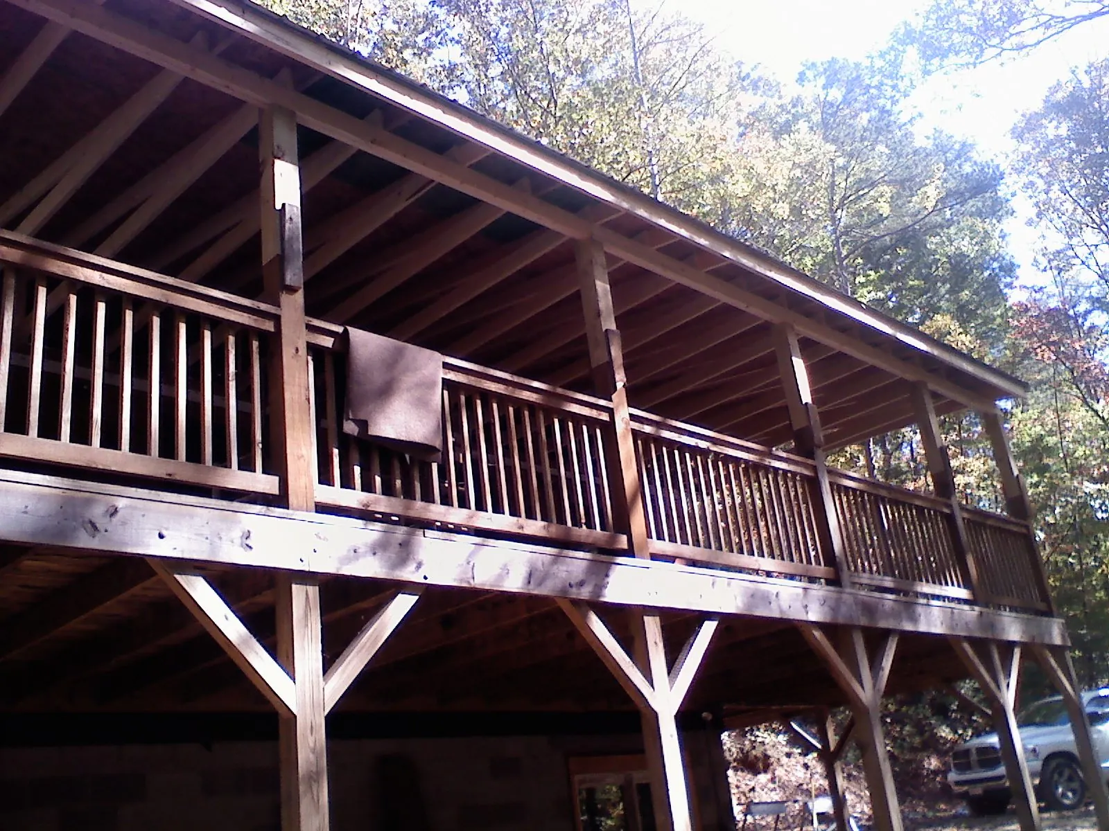 Timber framing under a new elevated porch and deck — Roof Leak Repair in Millburn by Roofing Brothers
